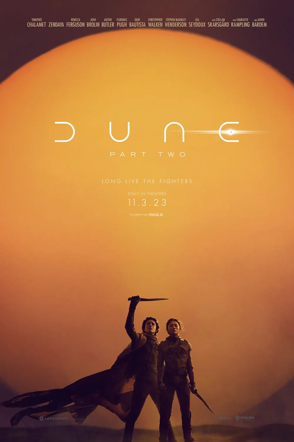 Official teaser key art from the Dune saga — a lone figure crossing the deep desert of Arrakis